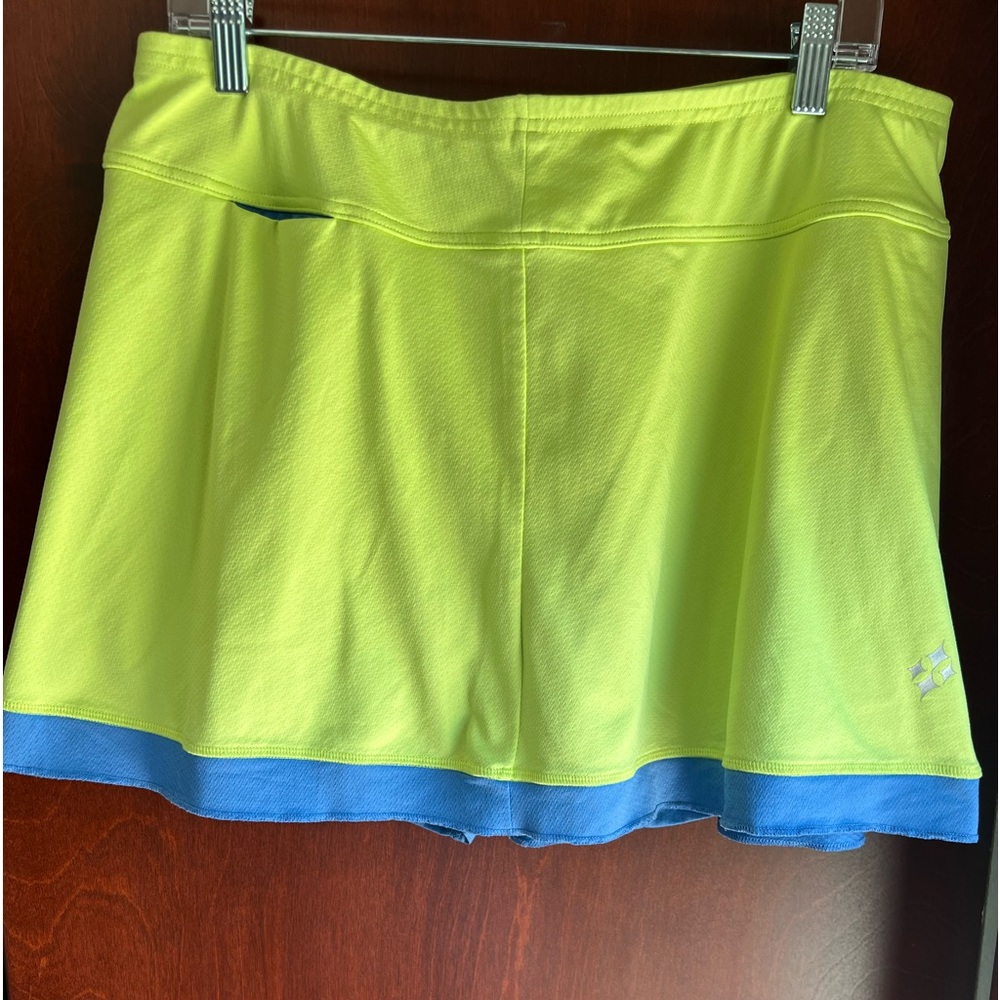 Jofit golf or pickleball skirt.   Apple green with french blue trim.